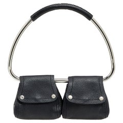 Prada Borsa a manico superiore in pelle nera con passante d'argento