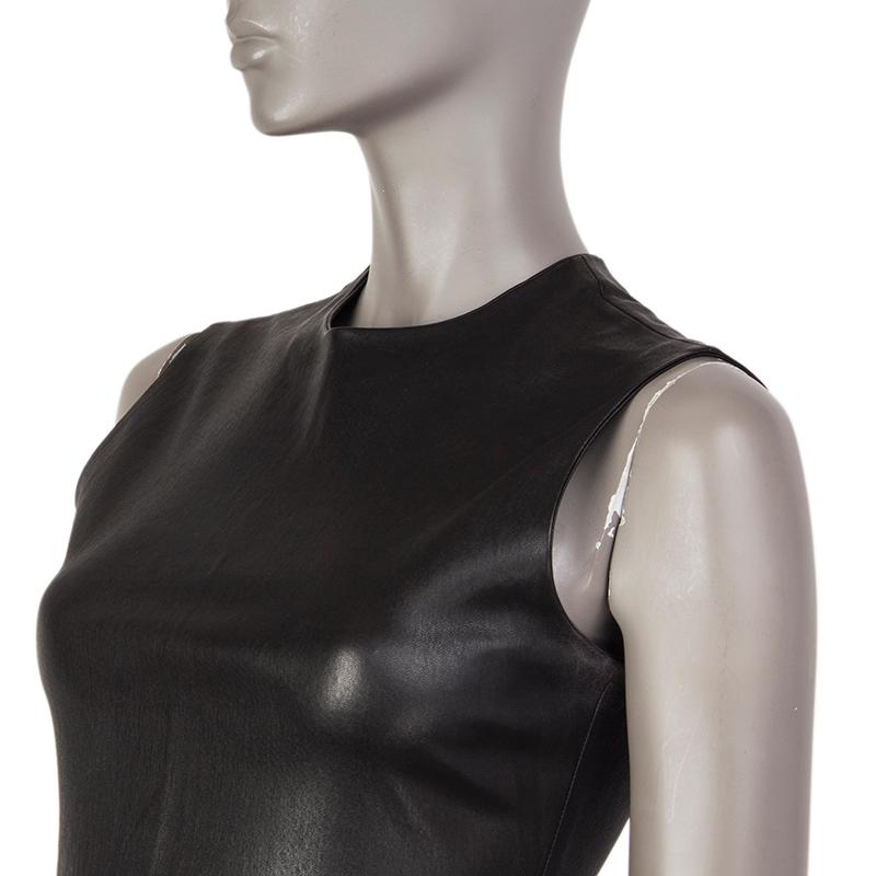 Prada crew-neck sheath dress in black leather. CLoses with hook and invisible zipper on the back. Unlined. Has been worn and is in excellent condition. 

Tag Size 40
Size S
Bust 80cm (31.2in) to 90cm (35.1in)
Waist 70cm (27.3in) to 74cm