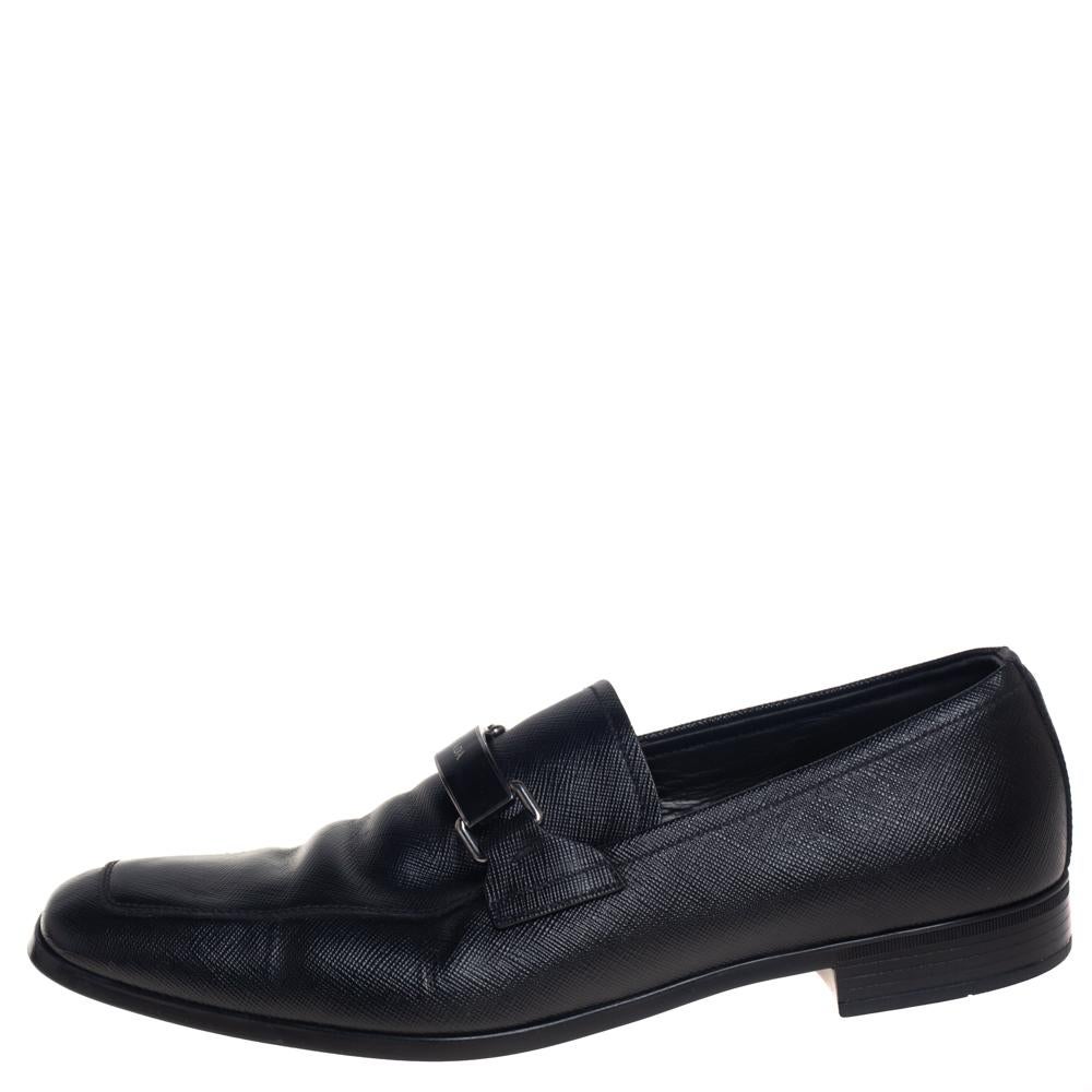 These slip-on loafers from Prada are the ideal pair you'll love having in your closet. They are crafted from leather in a classy black color and feature square toes and logo detailed accents on the vamps. They are complete with comfortable