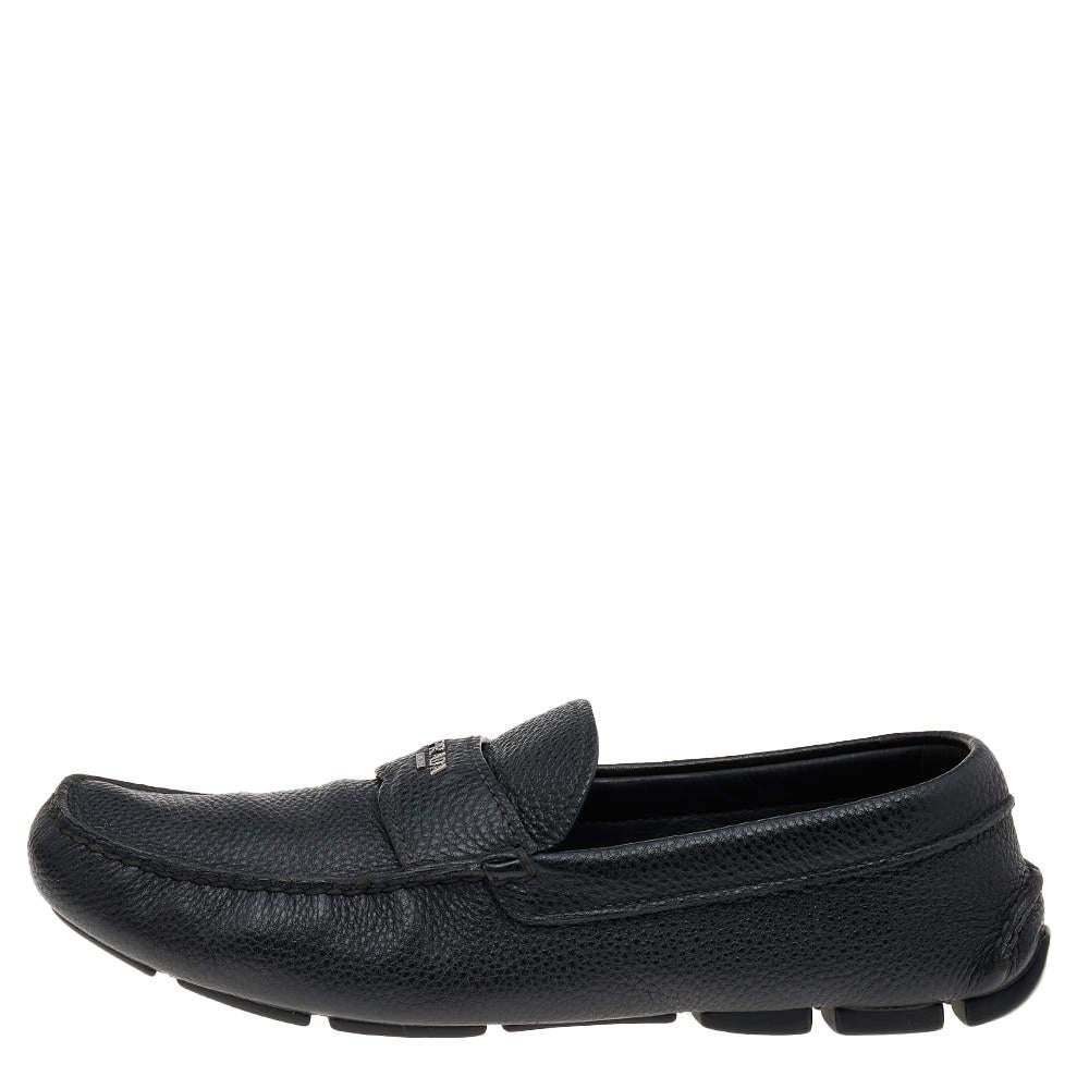 Let comfort and classic style be yours with these designer loafers from Prada. Crafted in black leather, the high-quality shoes have the perfect construction to take you through the day with utmost ease.


