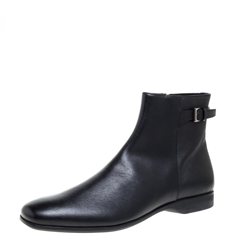 Prada promises to elevate your style with this distinguished pair of boots. Casual Fridays will look so much better at work thanks to these. They have been crafted from black-hued leather and have smart square-shaped toes. They are styled with a