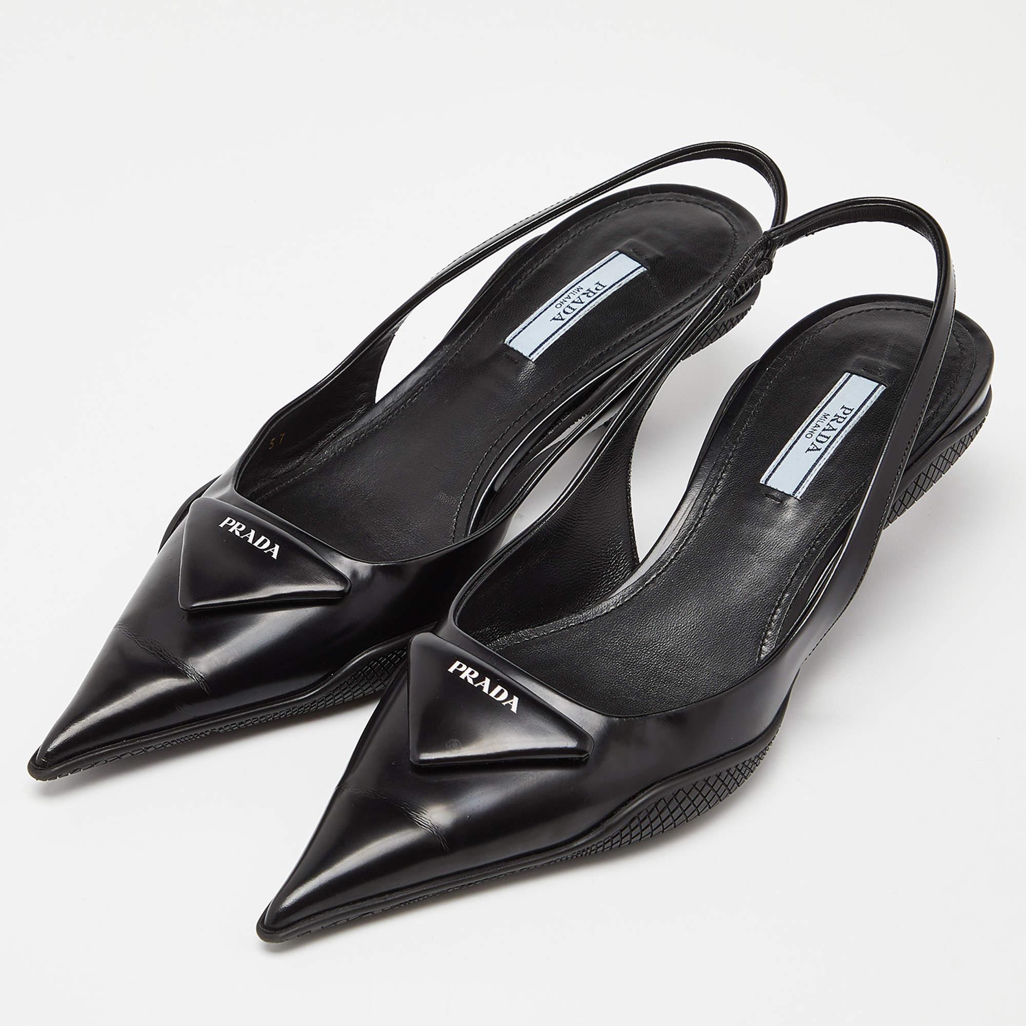 A simple pointed-toe slingback sandal elevated by a logo detail on the uppers brings out the modern charm of this Prada design. The sandals are made of black leather and carefully fashioned to ensure every step you take is comfortable and