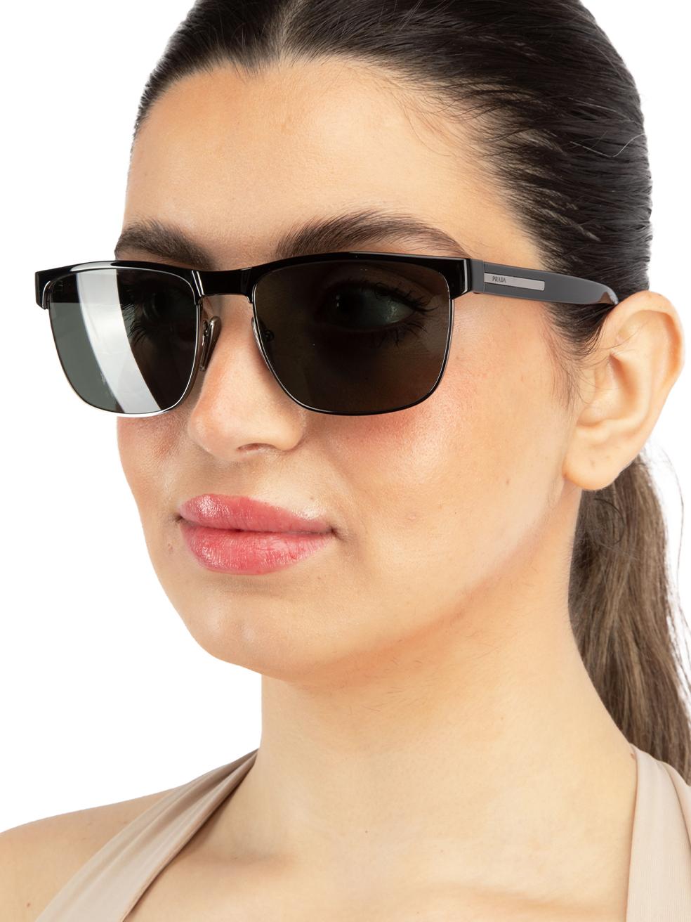 CONDITION is New with tags on this brand new Prada¬¨‚Ä†designer item. This item comes with original packaging.
 
 ¬¨‚Ä†
 
 Details
 
 
 Model: PR 66ZS
 
 Black
 
 Metal
 
 Square Eye Sunglasses
 
 Tinted Dark Grey Lens
 
 Branding at the arms
 

