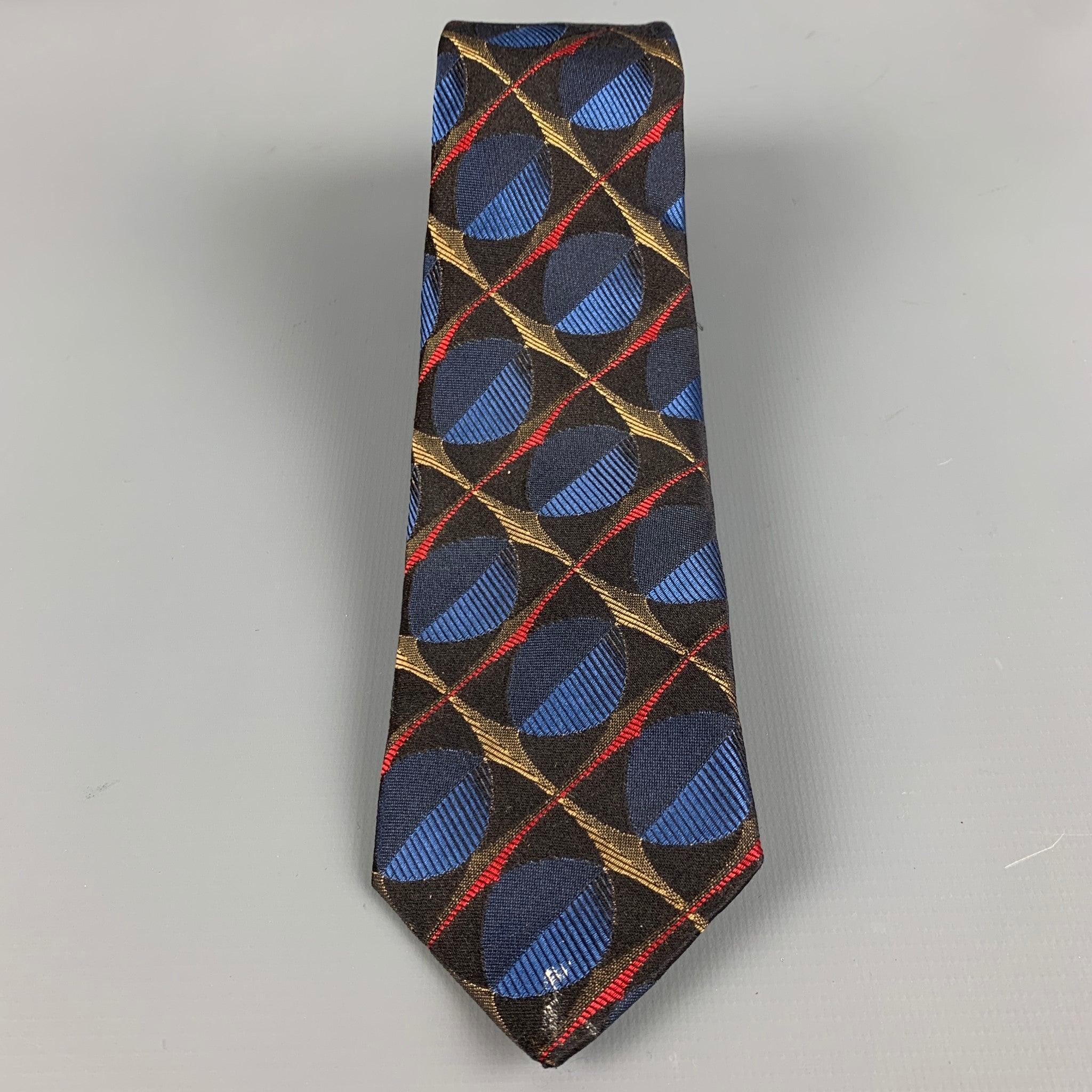 PRADA 
necktie in a black silk fabric featuring multi-color abstract jacquard pattern and skinny fit. Made in Italy.Good Pre-Owned Condition. Moderate signs of wear, as is. 

Measurements: 
  Width: 2.5 inches Length: 61 inches 
  
  
Reference: