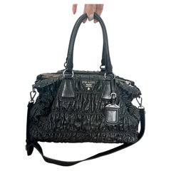 Used Prada Black Nappa Gaufre bag with leather lining and shoulder strap 