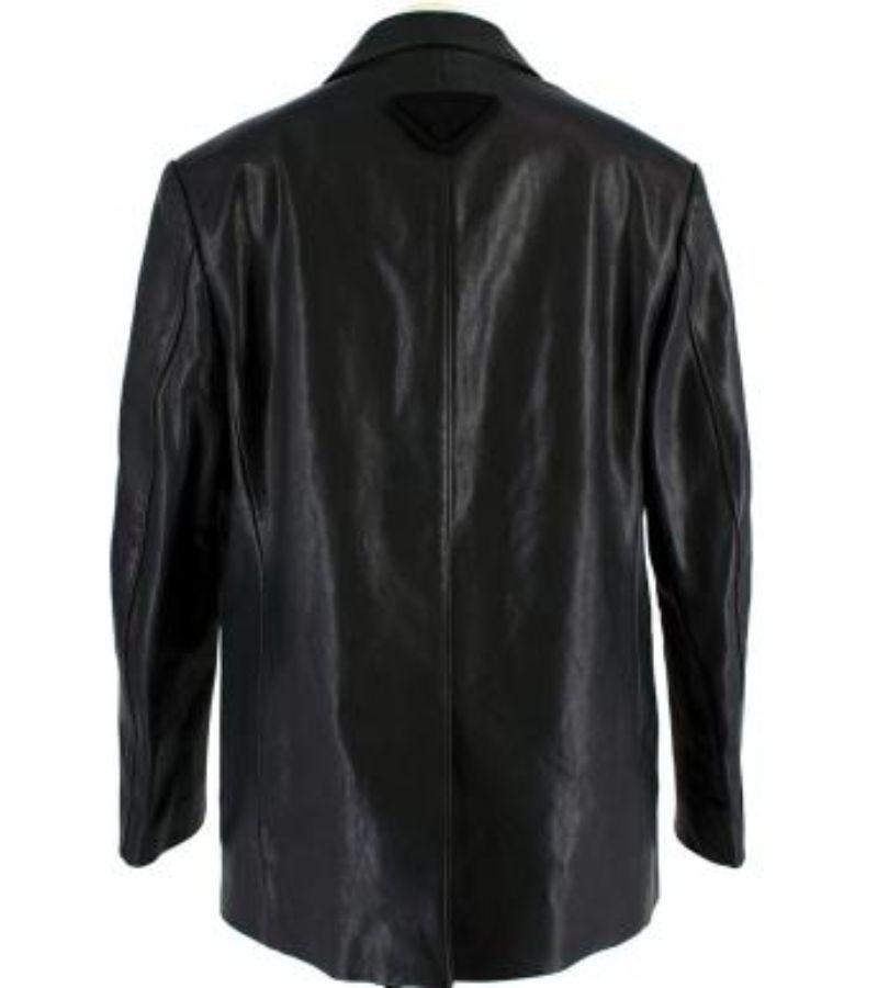 Prada Black Leather Jacket

-Fully lined 
-Button fastening 
-Waist insert pockets 
-Back vent 
-Mid weight construction 

Material: 

Leather 

Made in Italy 

PLEASE NOTE, THESE ITEMS ARE PRE-OWNED AND MAY SHOW SIGNS OF BEING STORED EVEN WHEN