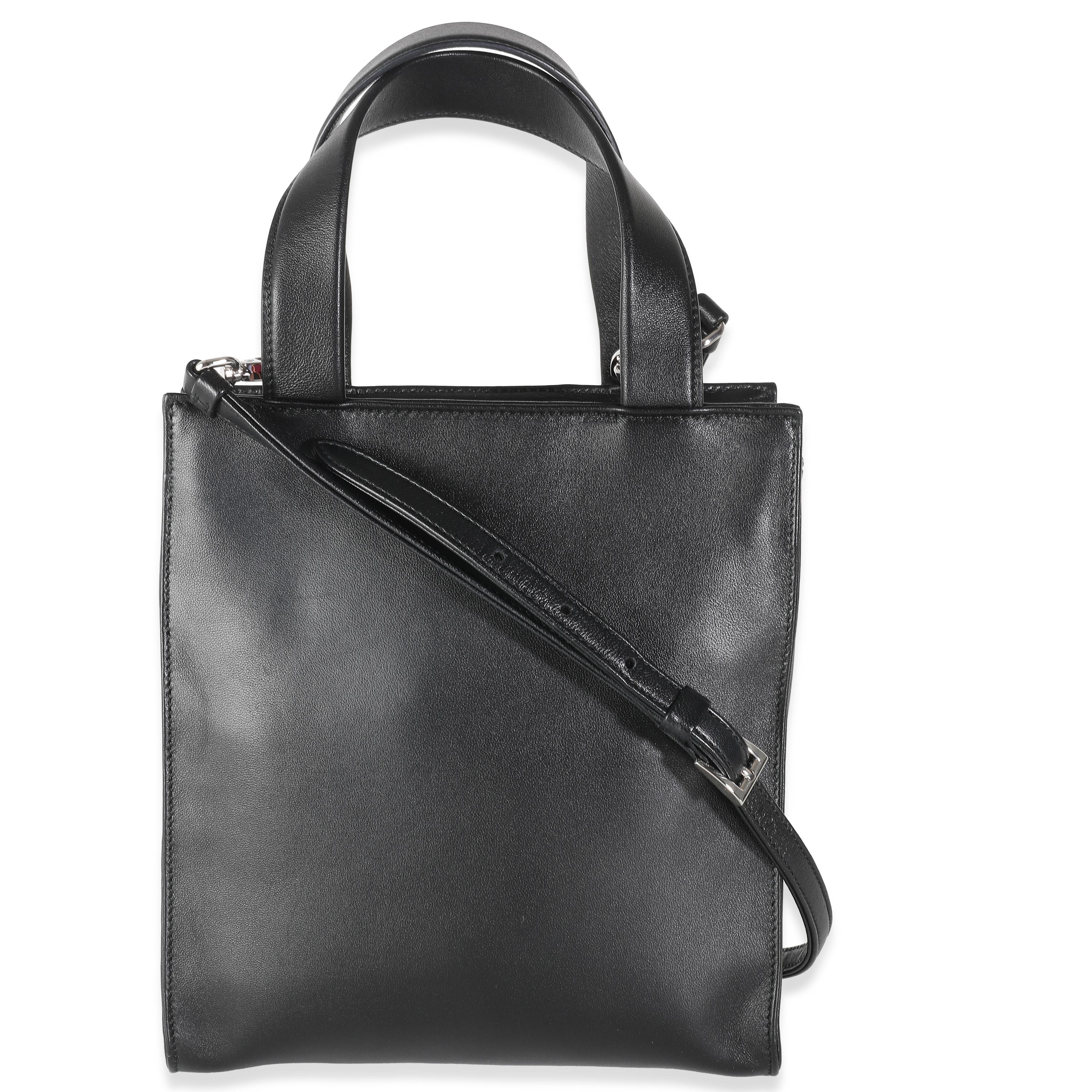Listing Title: Prada Black Nappa Small Triangle Pocket Tote
SKU: 139083
Condition: Pre-owned 
Handbag Condition: Excellent
Condition Comments: Item is in excellent condition and displays light signs of wear. Creasing to leather.
Brand: Prada
Model: