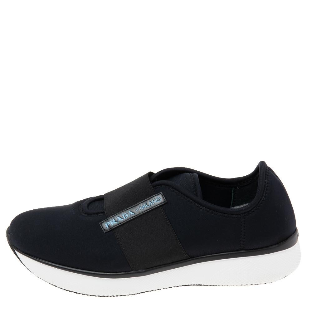 Simple yet sturdy and stylish, these sneakers from the House of Prada are a worthy pair to own! They are crafted from black neoprene on the exterior and feature an easy slip-on style. Add these sneakers to your collection today!

Includes: Original
