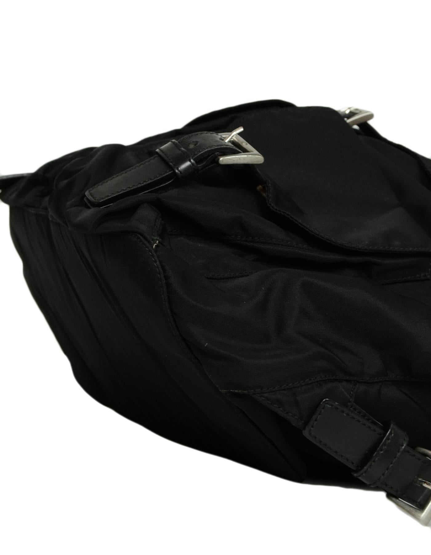 double buckle leather backpack