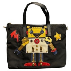 Prada - Borsa piccola in nylon nero con robot abbellito