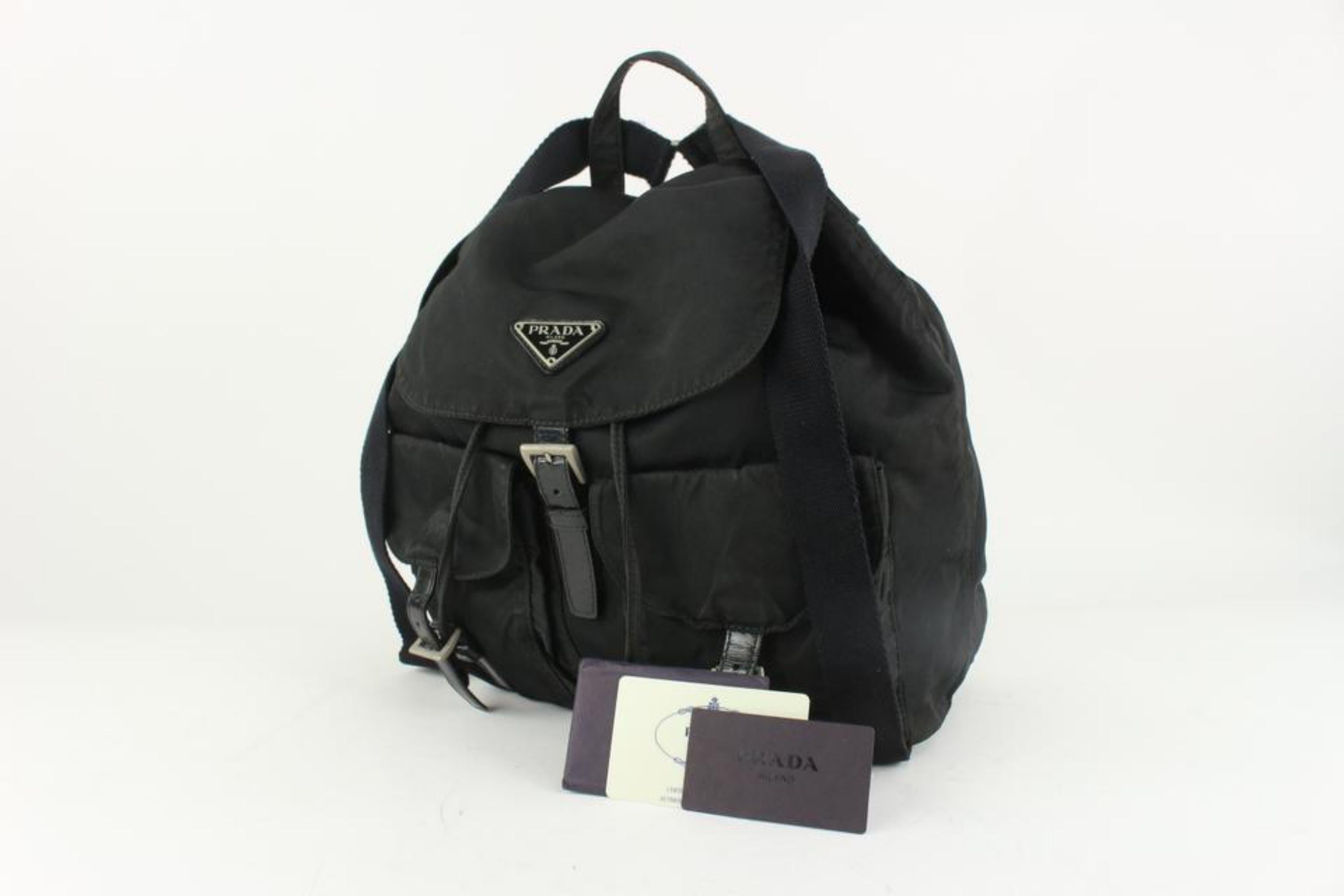 Prada Black Nylon Tessuto Twin Pocket Backpack 1216p31
Date Code/Serial Number: 50
Made In: Italy
Measurements: Length:  16