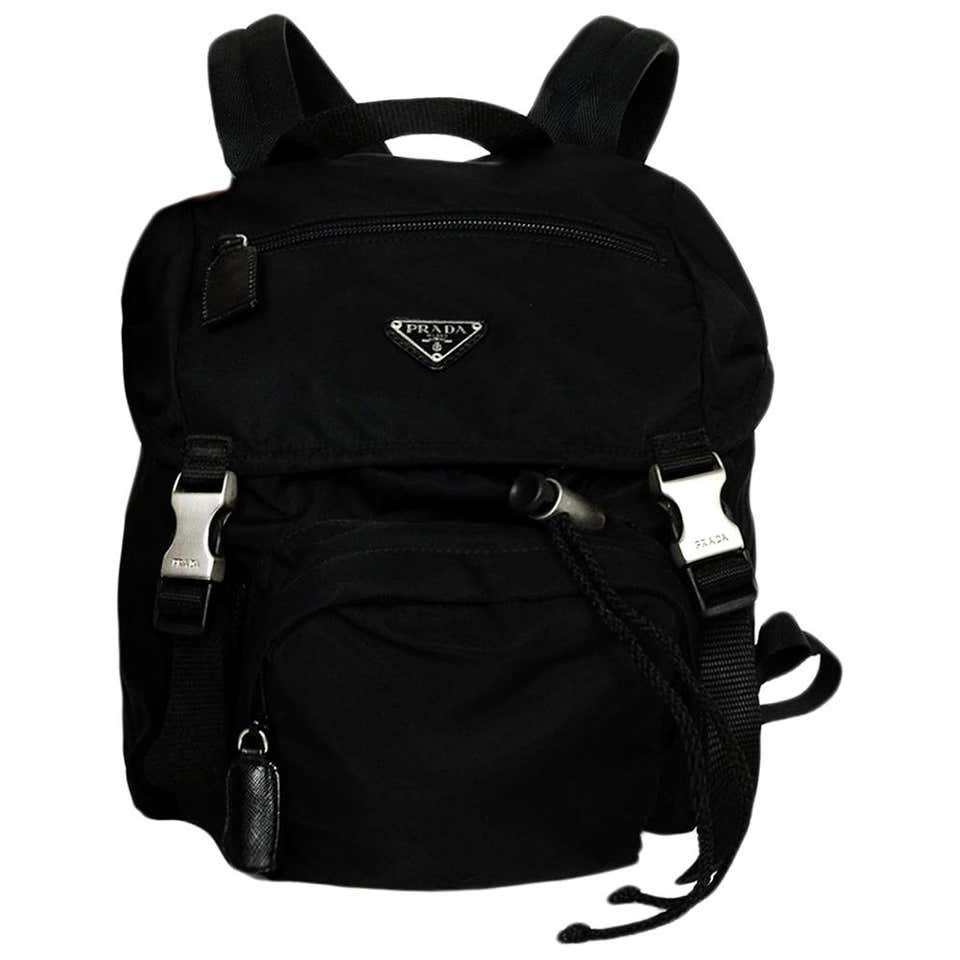 MCM Silver Canvas Monogram Black Crystal Studded Mini Backpack Bag at ...