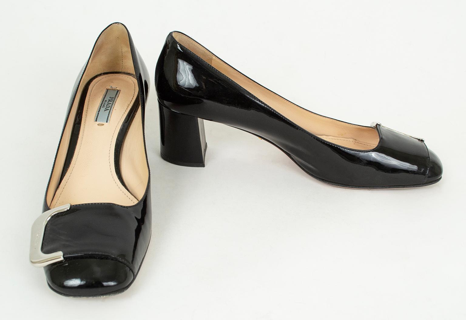 Hard to find a pump dainty enough to wear with a dress but substantial enough to pass as a loafer. These block heels fit the bill and feature a signed silver buckle that catches the eye.

Patent leather block heel loafer pump with signed silver