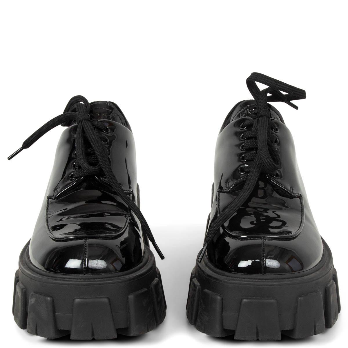 100% authentic Prada 2019 Monolith lace-up derby shoes in black patent leather. They're set on exaggerated chunky soles that feature embossed branding at the back. Have been worn once or twice and are in excellent condition. Come with dust bag.