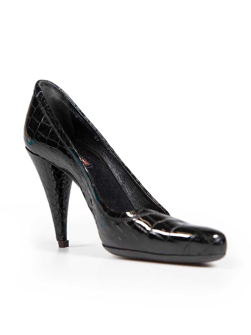 CONDITION is Good. Minor wear to heels is evident. Abrasions to the heels on both shoes where the leather has started to peel. The heel tips have been replaced on this used Prada designer resale item.
 
 Details
 Black
 Patent leather
 Pumps

