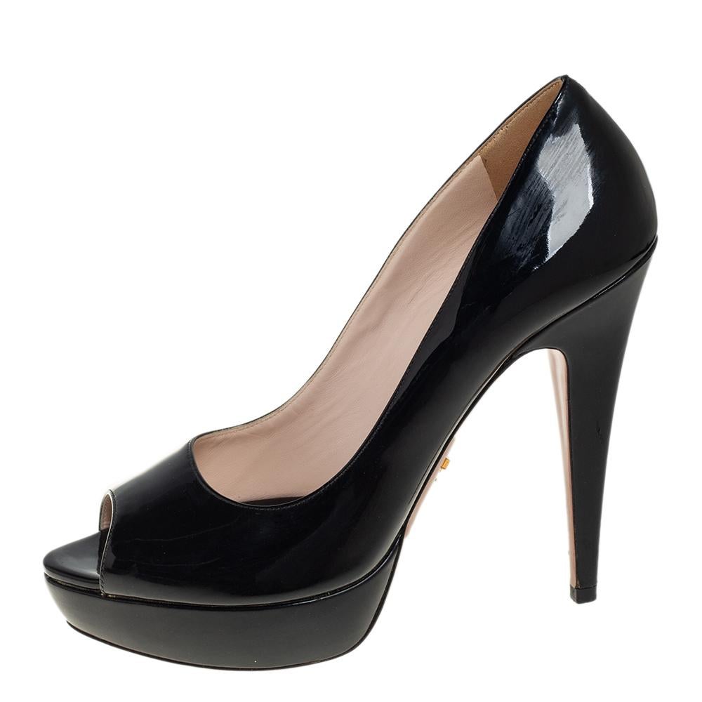 You are sure to love these amazing pumps from Prada as they're well-built and utterly gorgeous! They've been crafted from patent leather and designed with platforms, peep toes, 13 cm heels, and comfortable insoles.