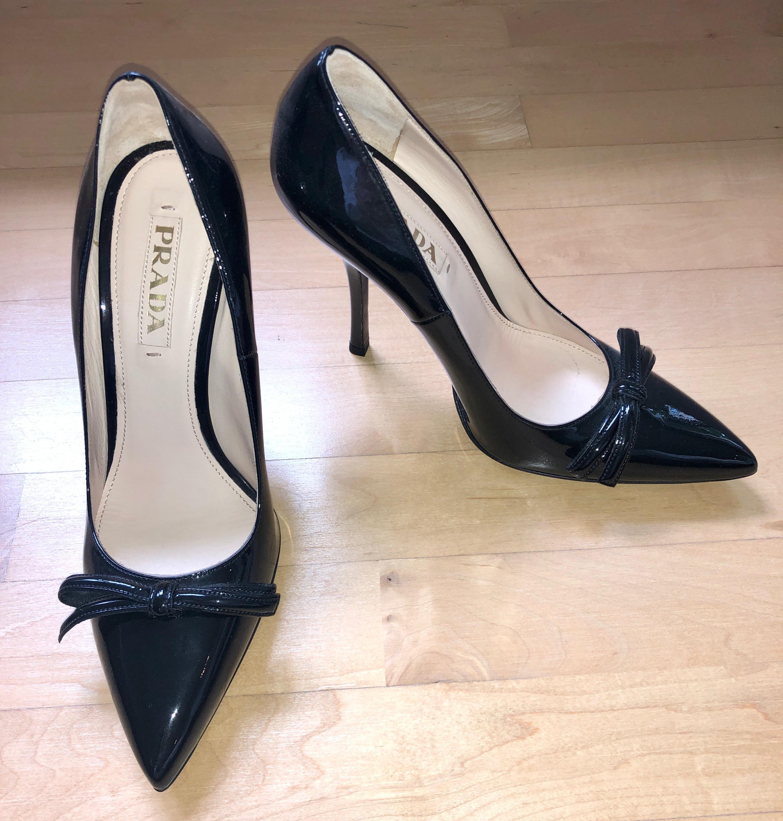 Make:  Miuccia Prada
Place of Manufacture:  Italy
Color:  Black
Size:  39.5
Materials:  Patent leather and leather
Condition:  Only used in the shoe department where purchased
Dust bag included with purchase

Offered is a pair of Prada black patent