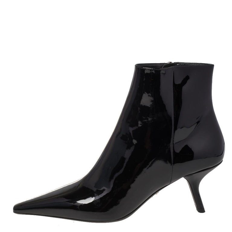 Sharp and Sleek: Prada Black Pointy Toed Boot