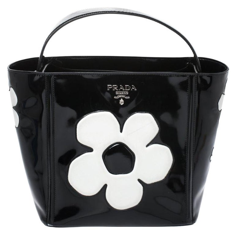 Prada Black Patent Leather Spazzolato Flower Top Handle Bag For Sale at  1stDibs | prada flower bag, prada daisy bag, prada spazzolato bag
