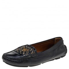 Mocasines de charol negro con tachuelas Prada talla 36
