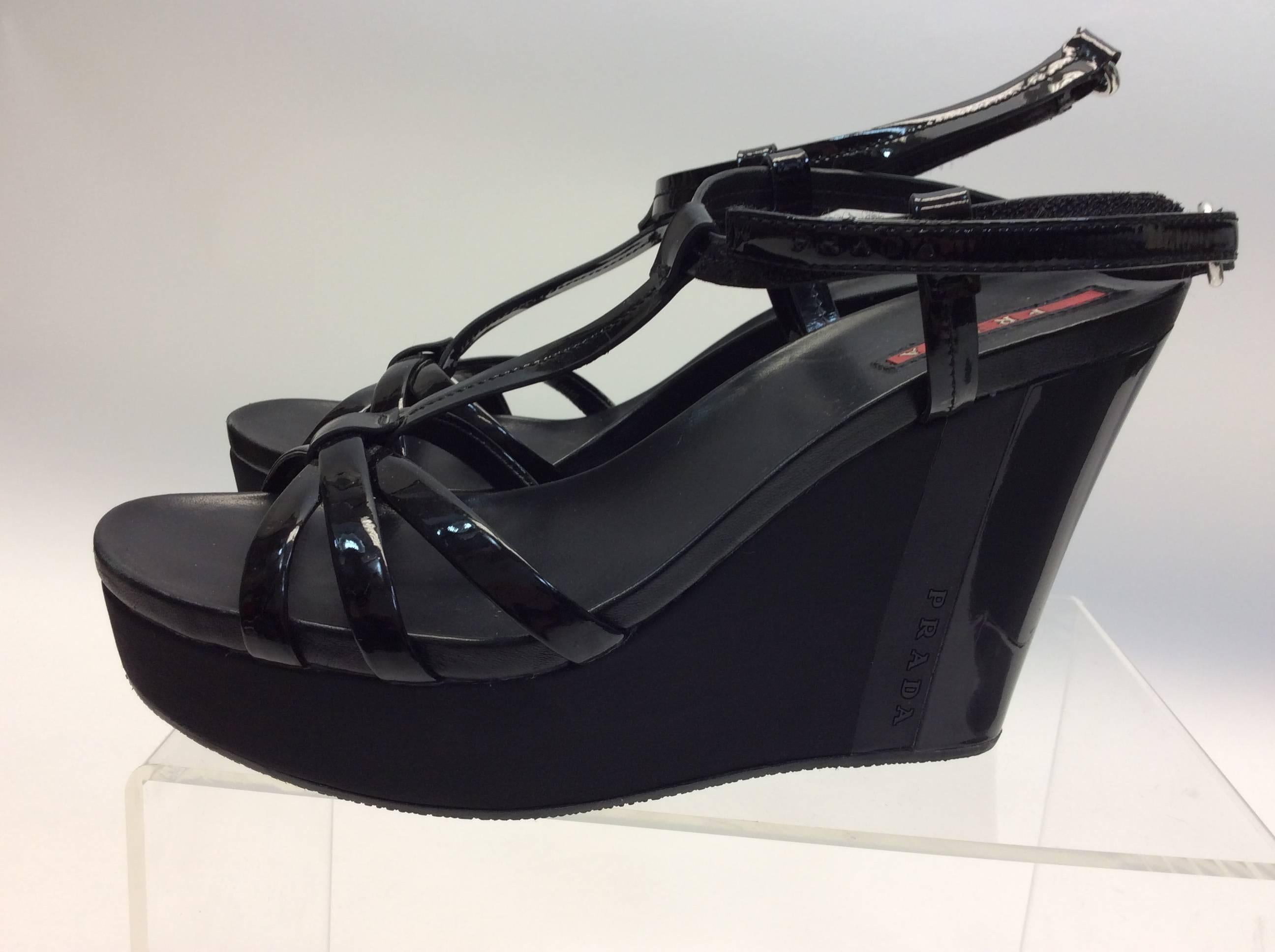 Prada Black Patent Leather Wedge
$225
Size 39
4.5” heel
1” platform