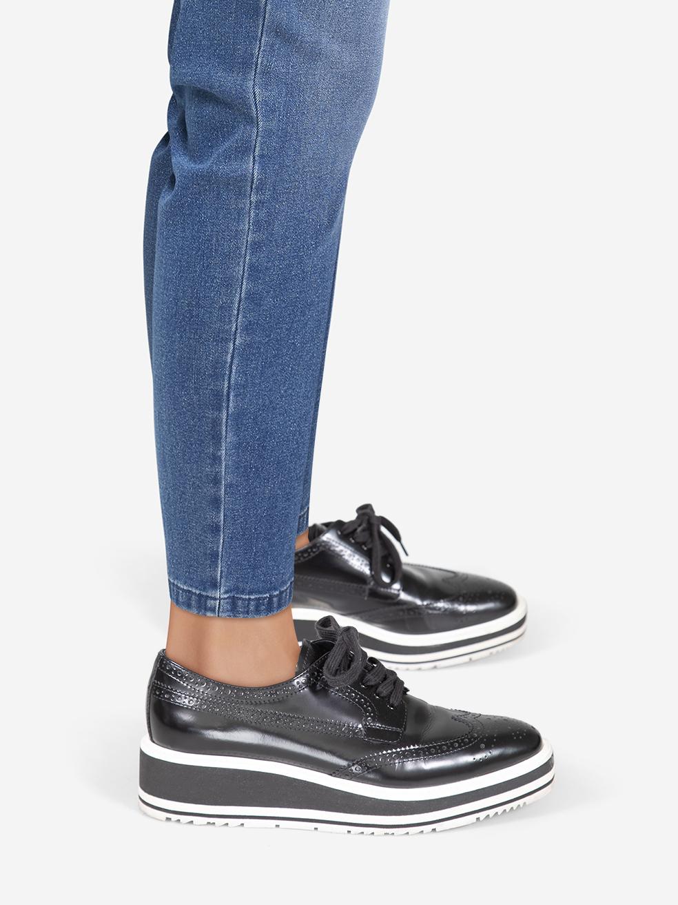 CONDITION is Very good. Minimal wear to the shoes is evident. General creasing to the leather on both toe boxes. Light abrasion on both sides of both shoes. Discolouration across the platforms on both shoes on this used Prada designer resale item.
