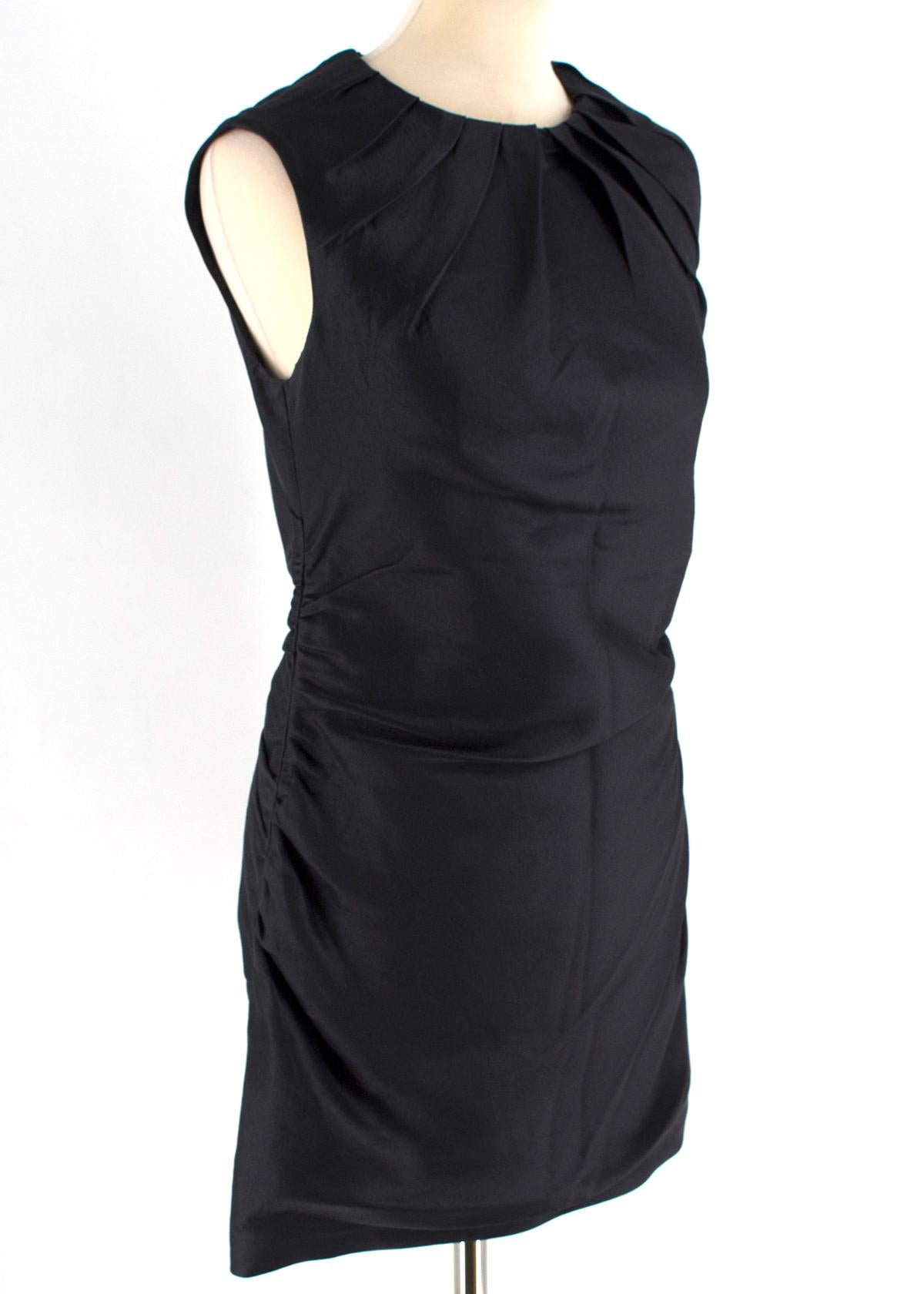 Prada Black pleated ruched sleeveless dress.

- Sleeveless dress
- Black silk/wool
- Ruched back/sides
- Pleated neck line
- Short dress
Measurements are taken laying flat, seam to seam. 

Length - 74cm
Shoulder width - 35cm
Chest width - 43cm 
