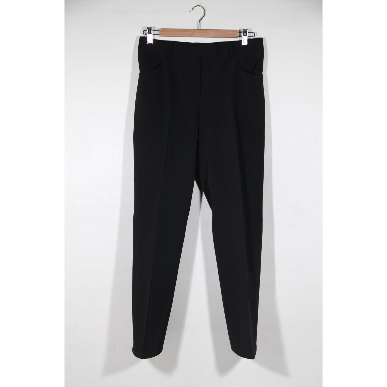 MATERIAL: Poly fabric COLOR: Black MODEL: Trousers GENDER: Women SIZE: Small COUNTRY OF MANUFACTURE: Condition CONDITION DETAILS: A :EXCELLENT CONDITION - Used once or twice. Looks mint. Imperceptible signs of wear may be present due to storage