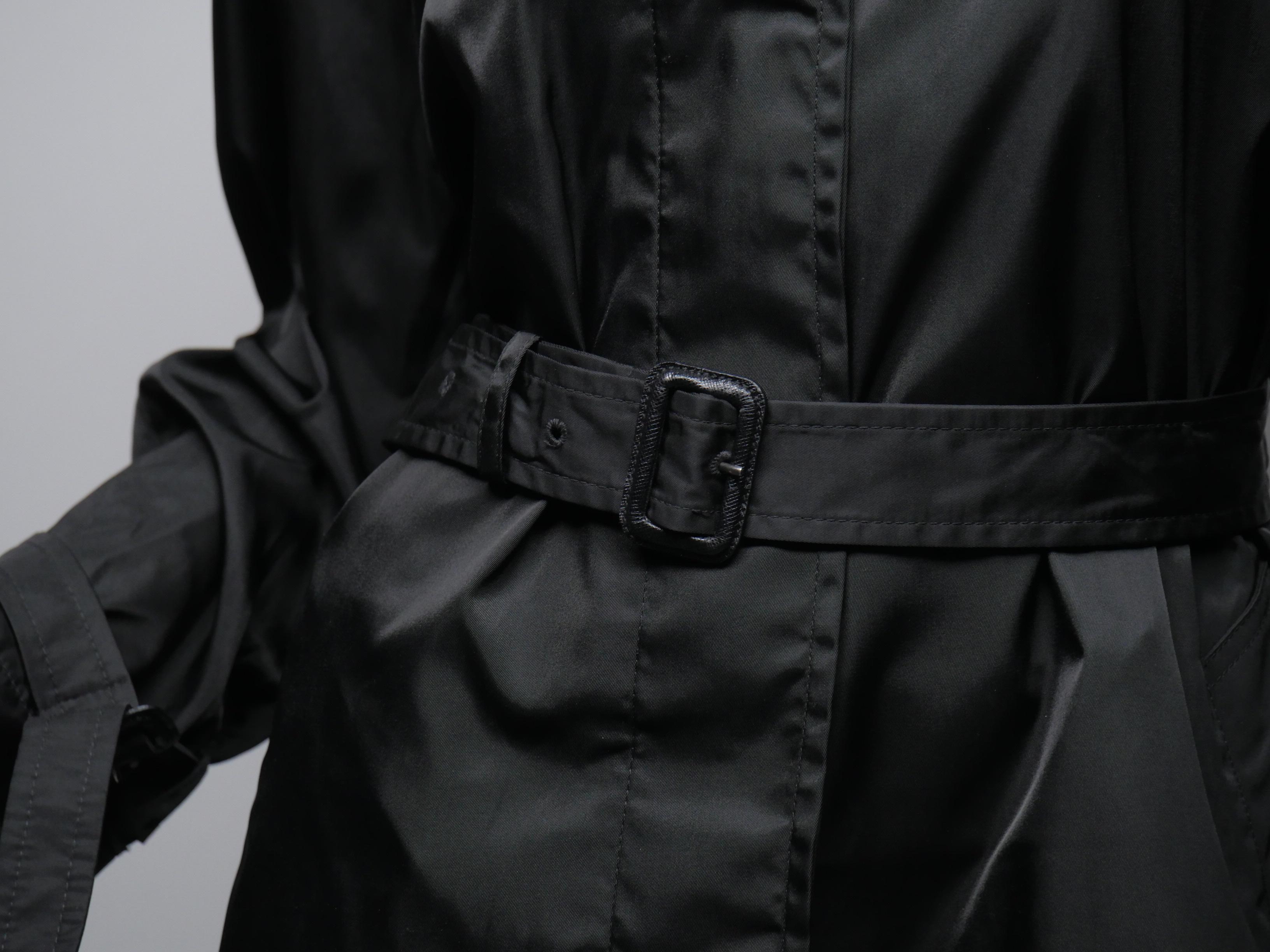 Black button down knee length rain coat with belt 