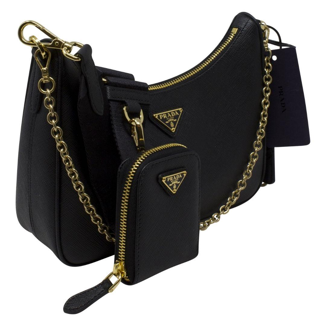 An iconic silhouette with sophisticated details that enhance the design: Prada transforms the classic shoulder bag, reinterpreting it in Saffiano leather with a cross-hatch motif that is a hallmark of the brand. The accessory is completed by a