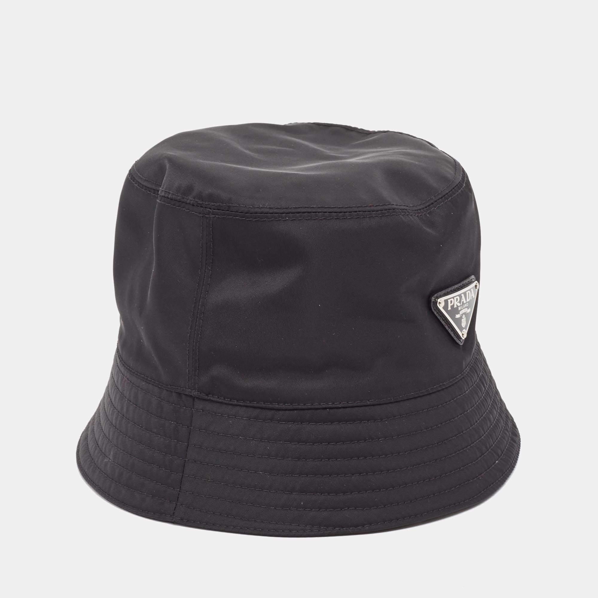 The use of recycled nylon, the black shade, and the brand accent come together to create this Prada bucket hat. A hat like this one is a style essential that will elevate your accessory game again and again.

