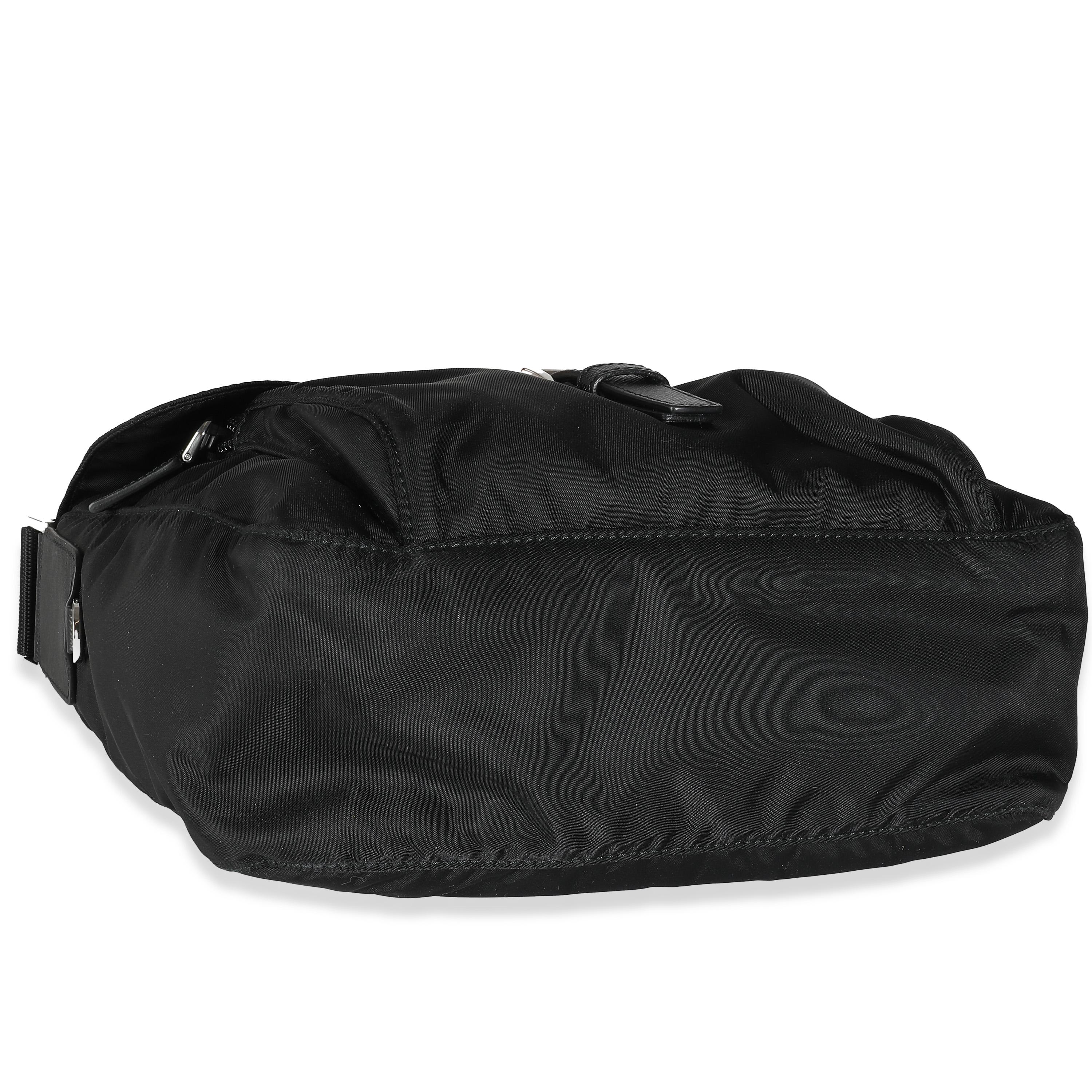 Listing Title: Prada Black Re-Nylon Front Pocket Shoulder Bag
SKU: 139018
MSRP: 2050.00 USD
Condition: Pre-owned 
Condition Description: Nylon has been synonymous with Prada since the House began to embrace the technical fabric in the ‘90s. The