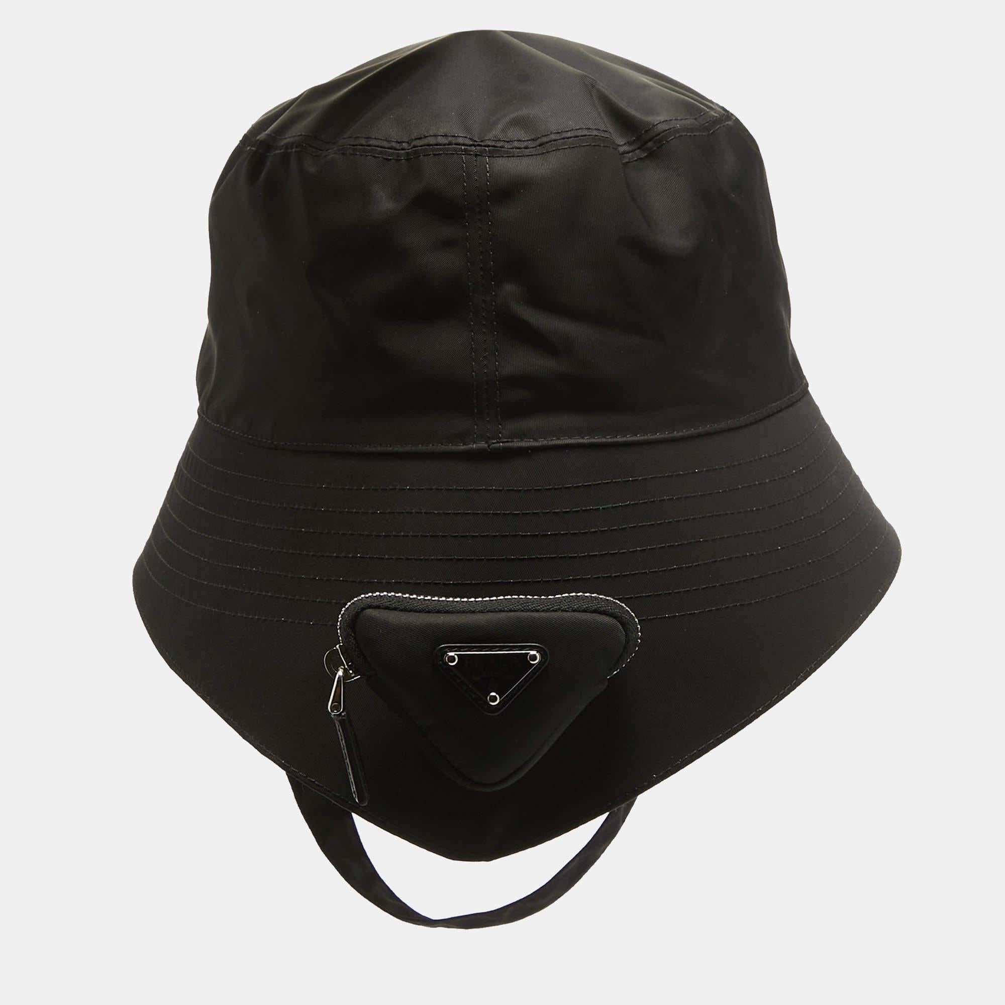 The Prada bucket hat has a classic appeal, and this fashion accessory will fit well in your casual wardrobe. Crafted from ethically sourced re-nylon, the hat is accented with a brand logo on the front.

