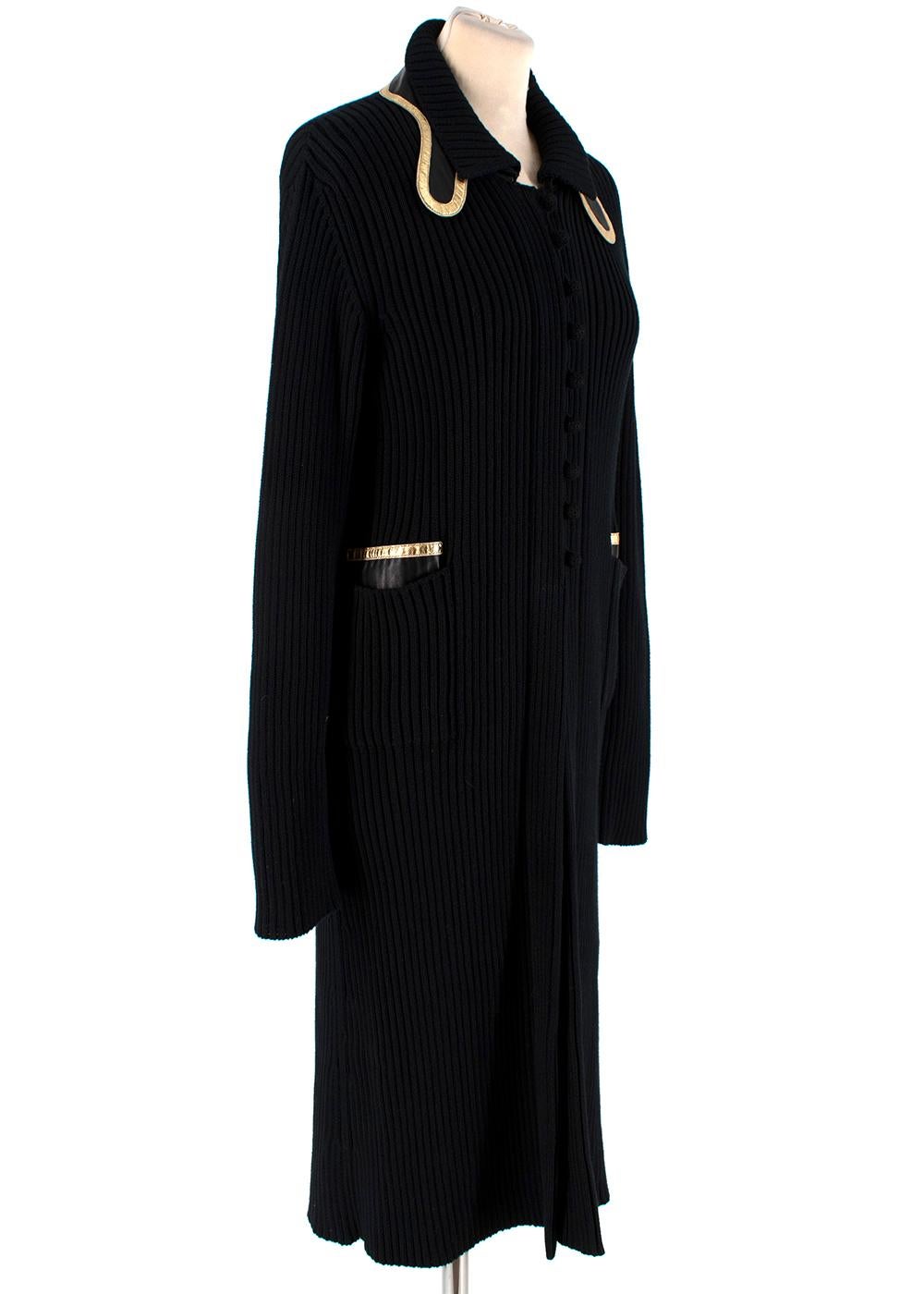 Prada Black ribbed knitted Long Cardigan with Gold Trim

- Leather and Gold trim to collar and pockets 
- Button down front closure 
-  straight hemline 
- ribbed texture to knit 


Materials 
100% Cotton 

shoulder: 14cm
sleeves: 64cm
Length: 96cm