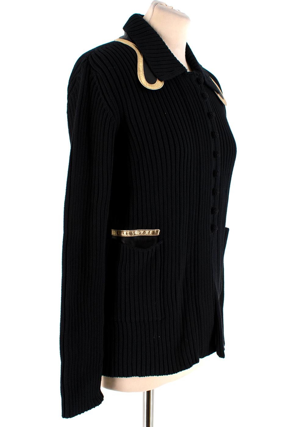 Prada Black Ribbed Knitted Cardigan with Gold Trim

- Button down front closure 
- ribbed knit 
- Leather and Gold trim to layered collar 
- Front Slip pockets 
- straight hemline

Materials 
100% Cotton 
Measurements are taken laying flat, seam to