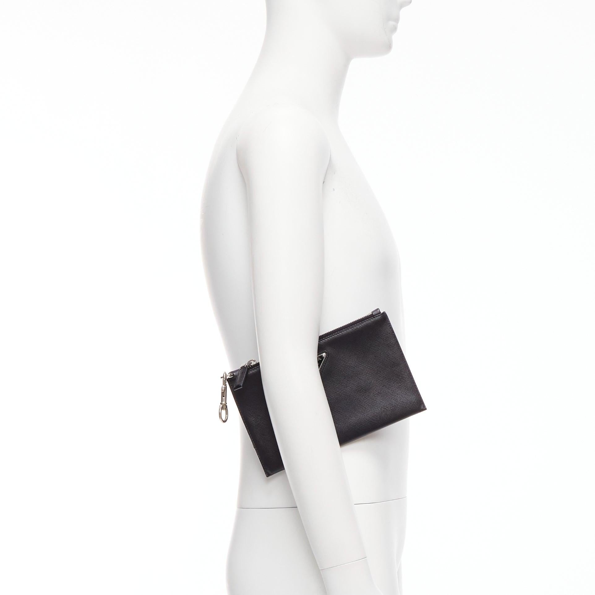PRADA black saffianno leather silver triangle logo zip small clutch bag
Reference: MLCO/A00026
Brand: Prada
Designer: Miuccia Prada
Material: Leather
Color: Black, Silver
Pattern: Solid
Closure: Zip
Lining: Black Leather
Extra Details: Zip