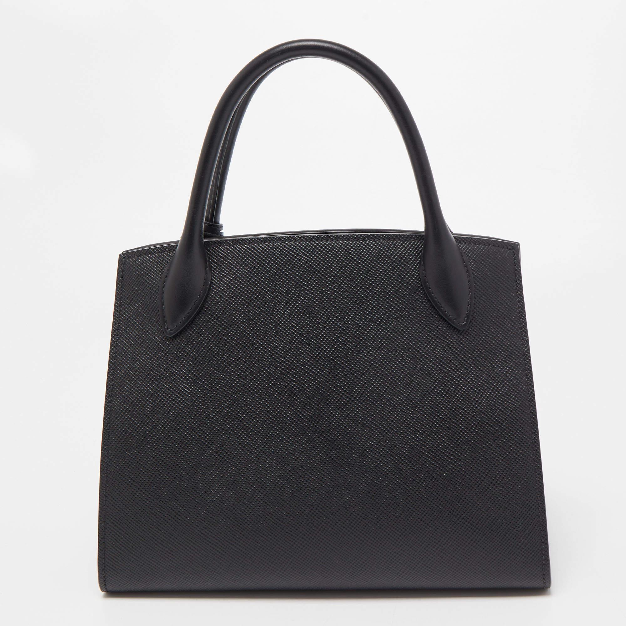 A classic handbag comes with the promise of enduring appeal, boosting your style time and again. This Prada Monochrome bag is one such creation. It’s a fine purchase.

Includes: Original Dustbag, Info Booklet, Authenticity Card, Detachable Strap