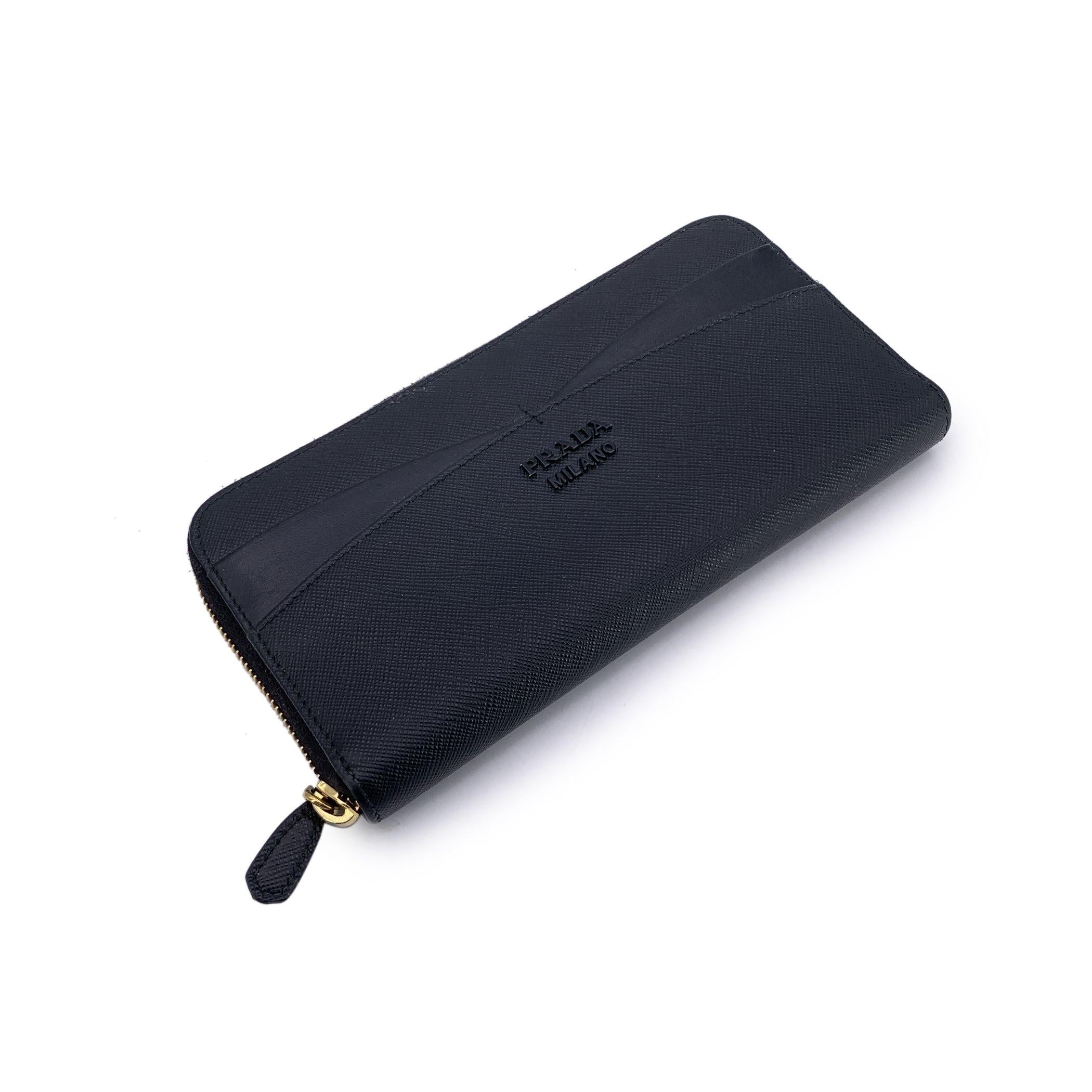 In the world of timeless accessories, the Prada Saffiano Zip-Around Wallet stands as a quiet testament to understated luxury. Made in Italy from 100% calfskin leather, its iconic Saffiano crosshatch finish isn't just a visual signature - it's a
