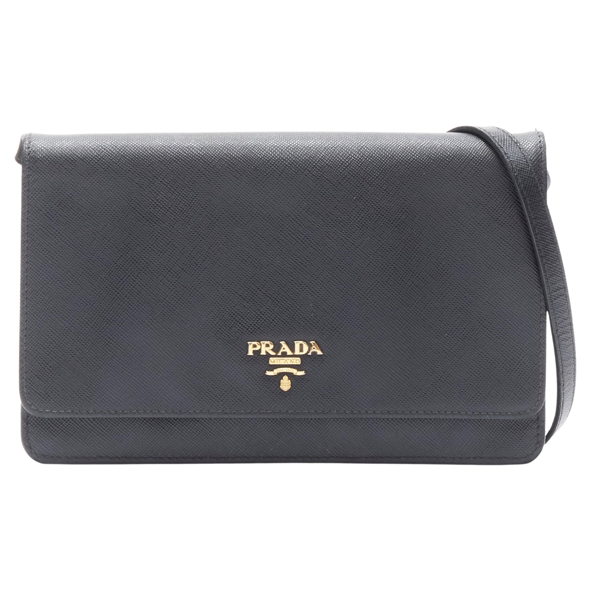 PRADA black saffiano leather gold metal logo flap crossbody clutch bag For  Sale at 1stDibs