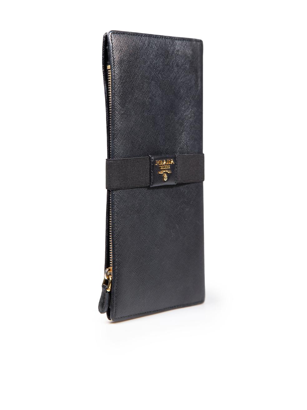CONDITION is Very good. Minimal wear to the wallet is evident. There are small scratches and discolouration to the front centre, rear centre, and the top of the last compartment, and abrasions to the front and rear cornerson this used Prada designer