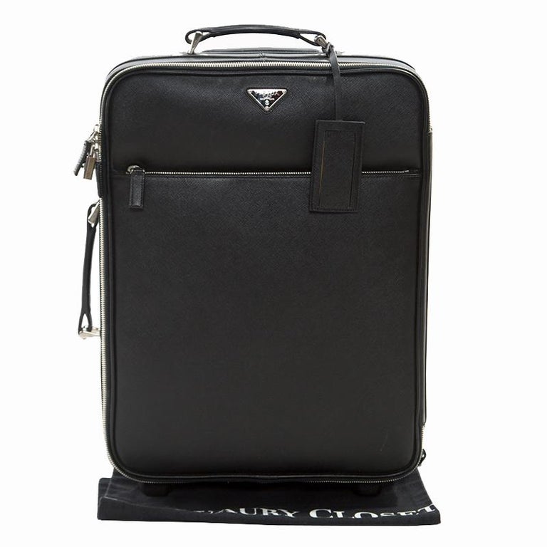 Prada Black Saffiano Leather Trolley Rolling Luggage For Sale at 1stDibs | prada  trolley luggage, leather trolly bag, prada trolley bag