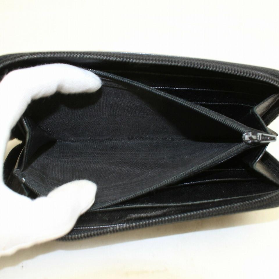 Portafoglio Zippy lungo 871093 in pelle saffiano nera di Prada 4