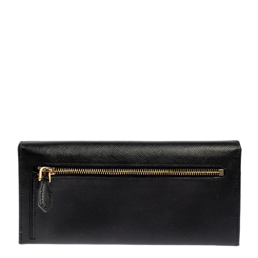 Prada's immaculate craftsmanship is translated into this continental wallet. Designed to perfection and crafted from black Saffiano Lux leather, this wallet can be your go-to accessory. It has a front flap that flaunts the label's accent. The