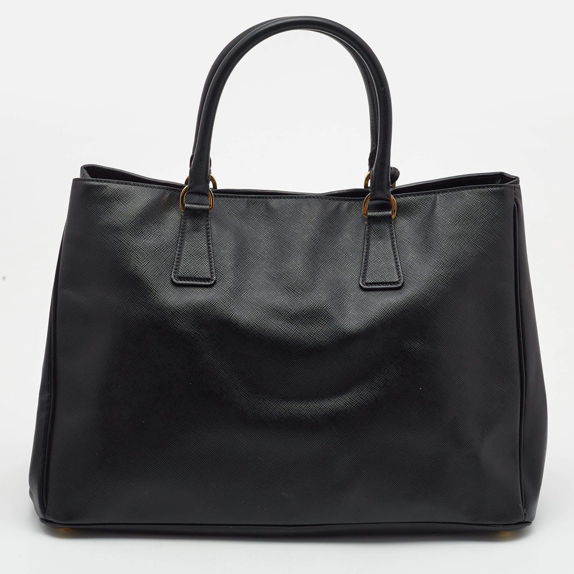 Carry everything you need in style thanks to this Prada leather tote. Crafted from the best materials, this is an accessory that promises enduring style and usage.

Includes: Original Dustbag

 