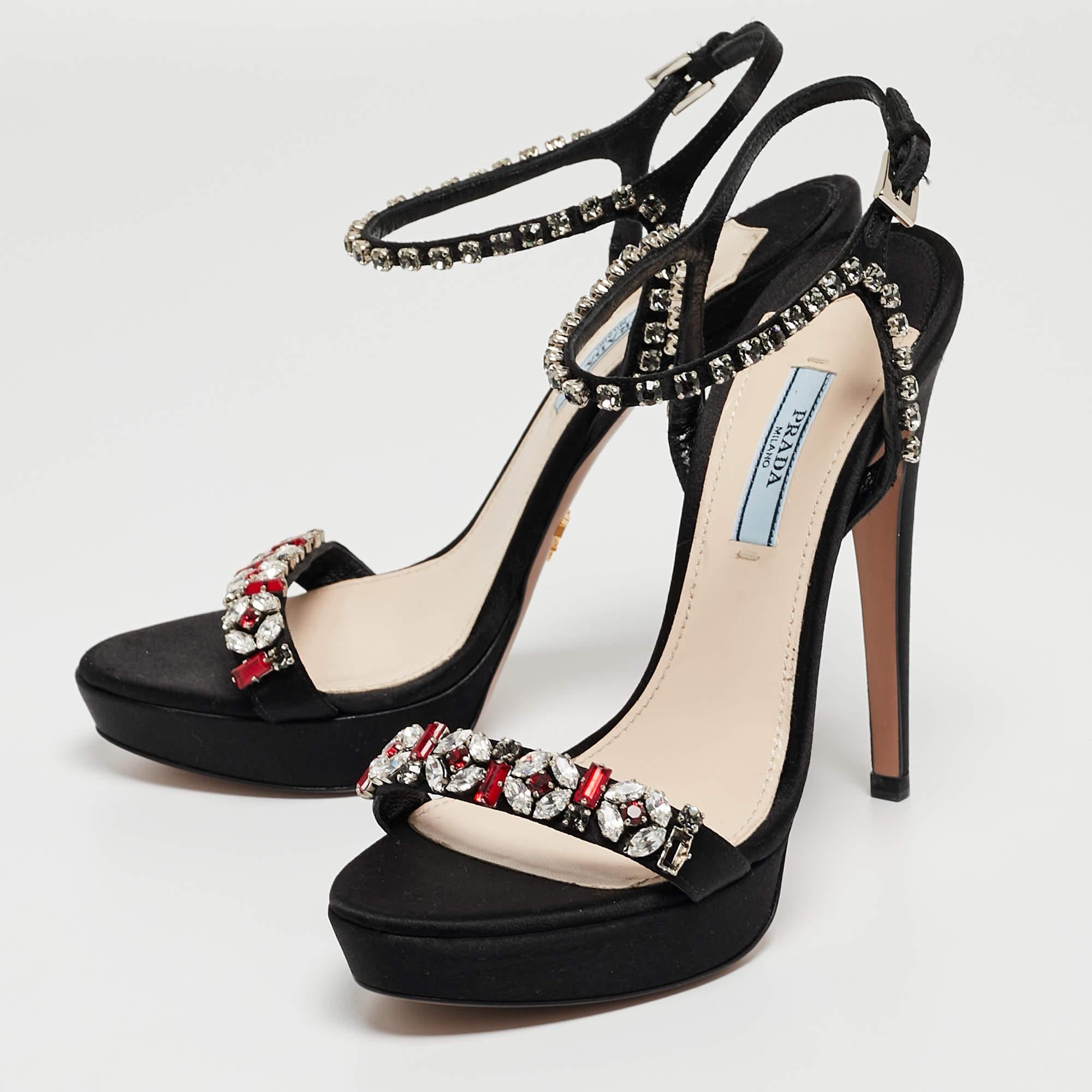 Complement your well-put-together outfit with these embellished sandals by Prada. Minimal and classy, they have an amazing construction for enduring quality and comfortable fit.

