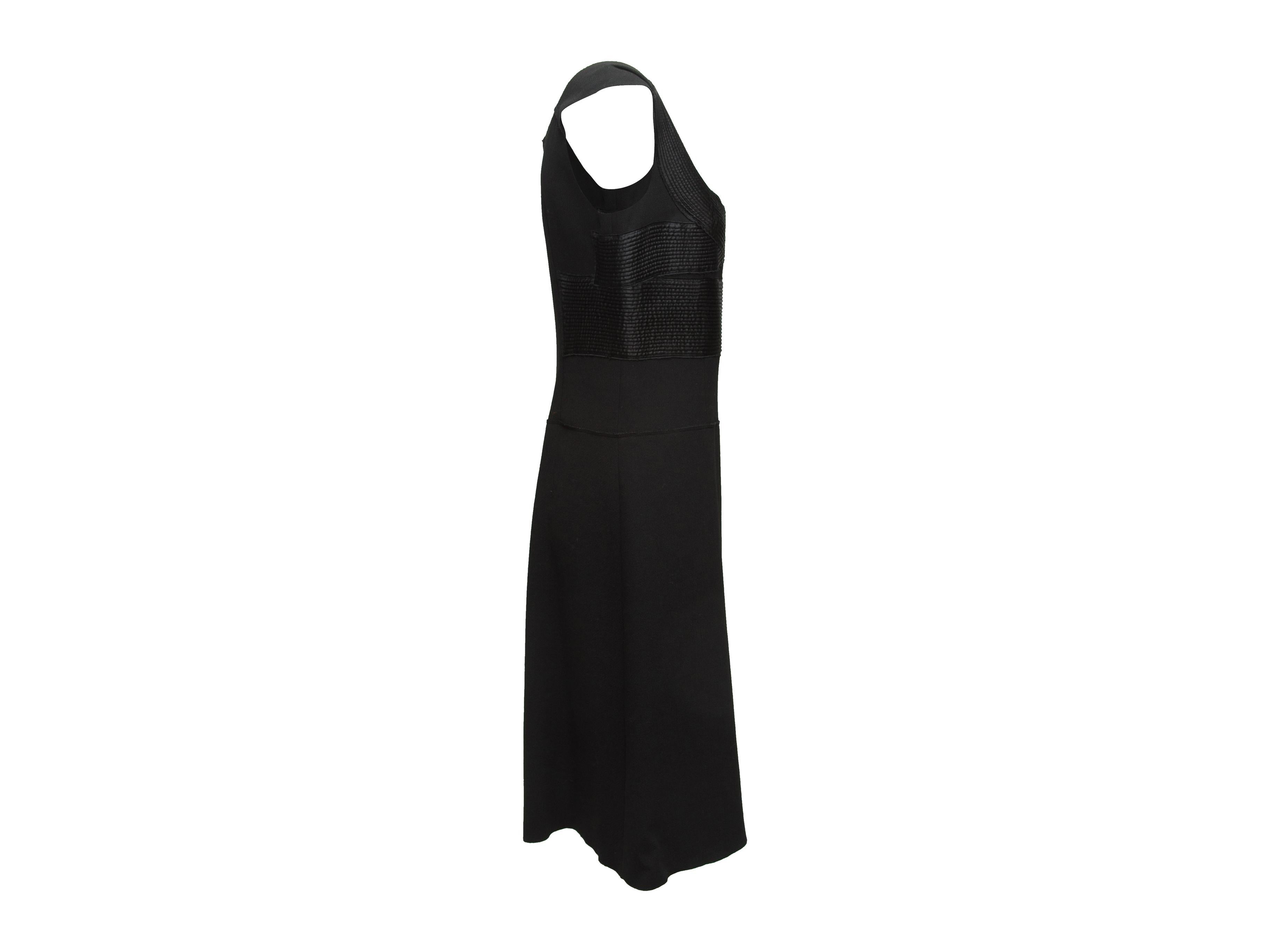 Product details:  Black satin-pleated dress by Prada.  Scoopneck.  Sleeveless.  Label size IT 44.  32