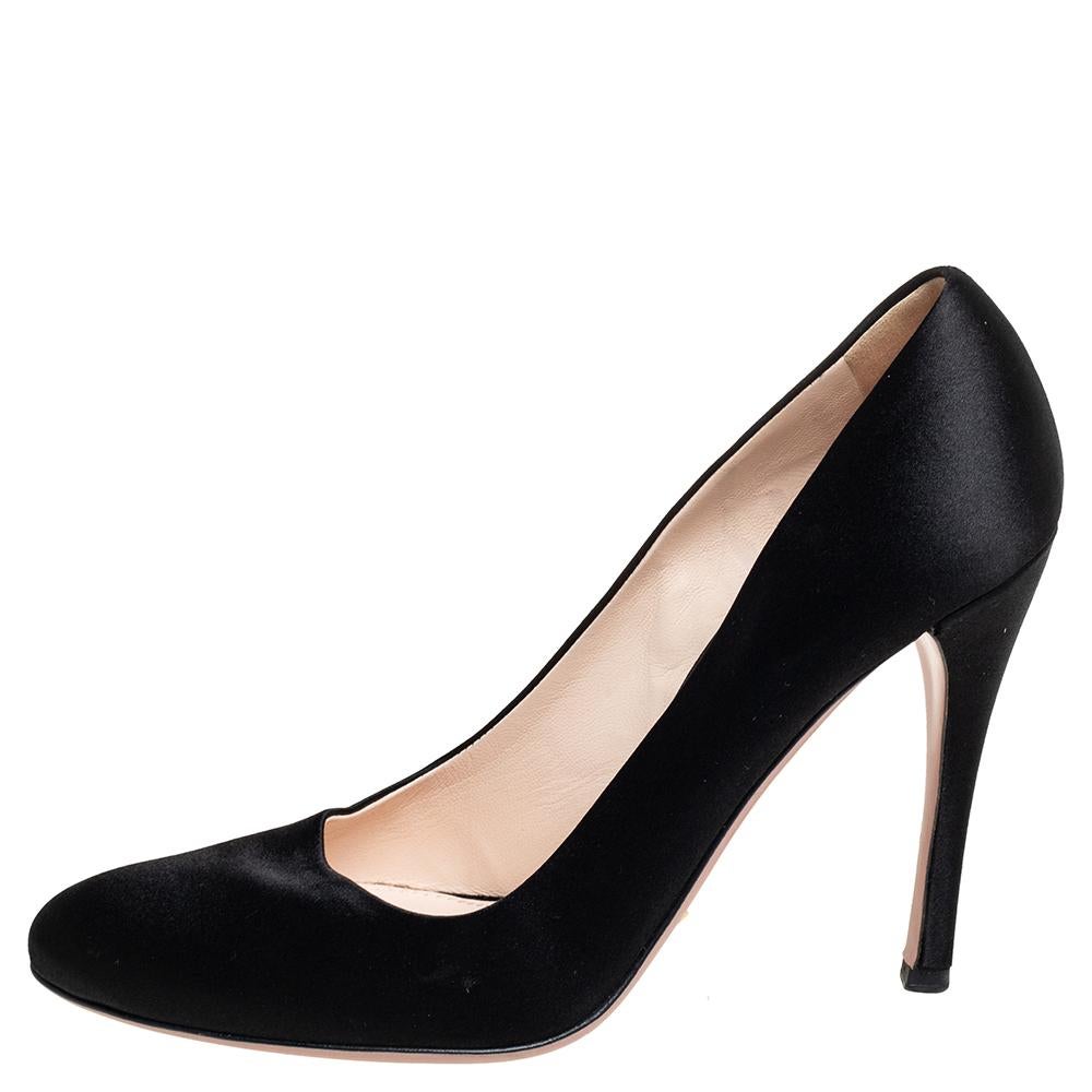 Don't miss the chance to add a classic pair of Prada shoes to your closet with these pumps! They are constructed using satin as well as leather and designed with covered toes, lined insoles, and 11 cm heels.

