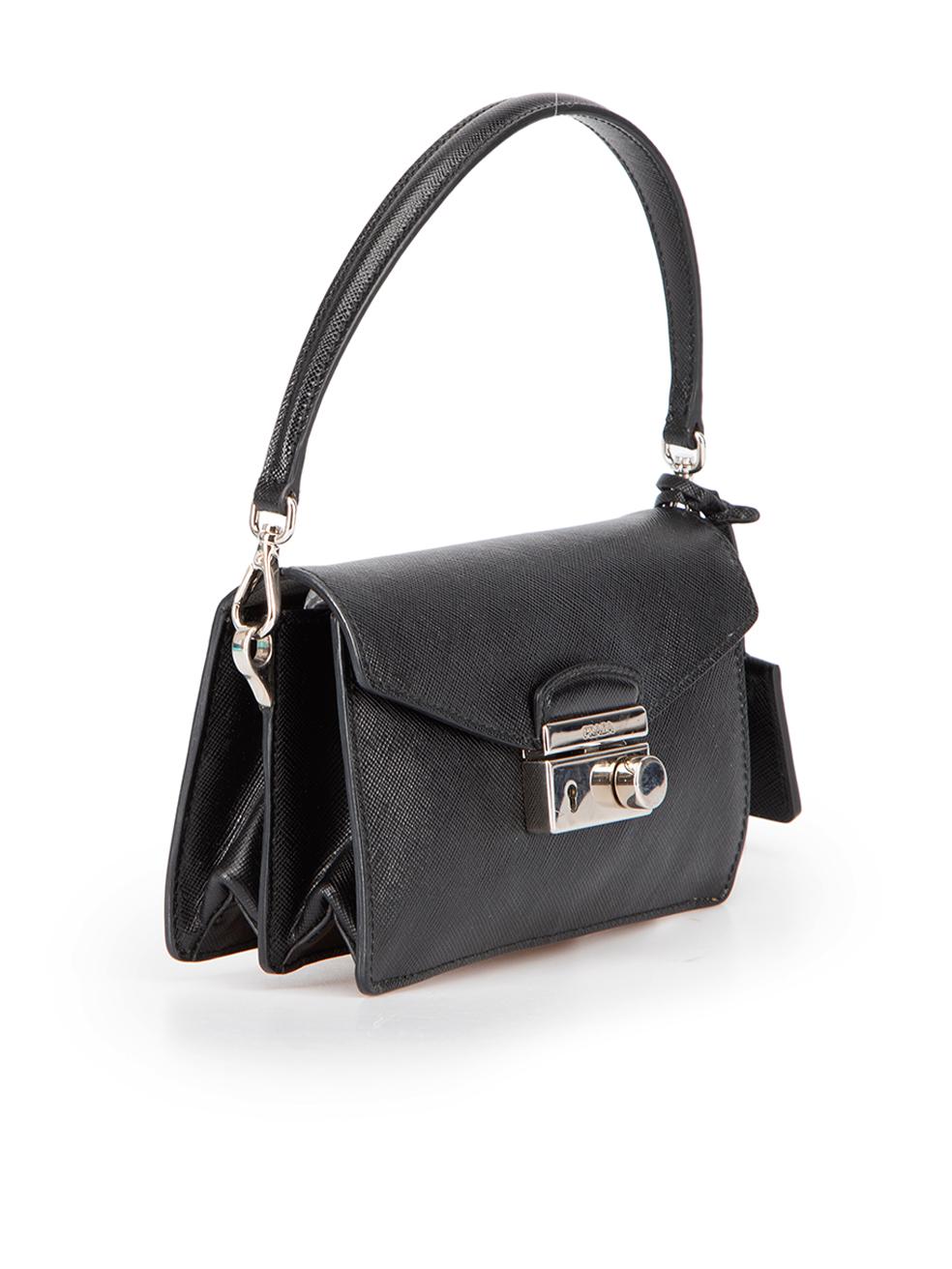 CONDITION is Good. Minor wear to bag is evident. Light wear to leather with very mild hardware tarnishing and discoloured mark found at lining on this used Prada designer resale item.

Details
Black
Scotchgrain saffiano leather
Mini crossbody bag
1x
