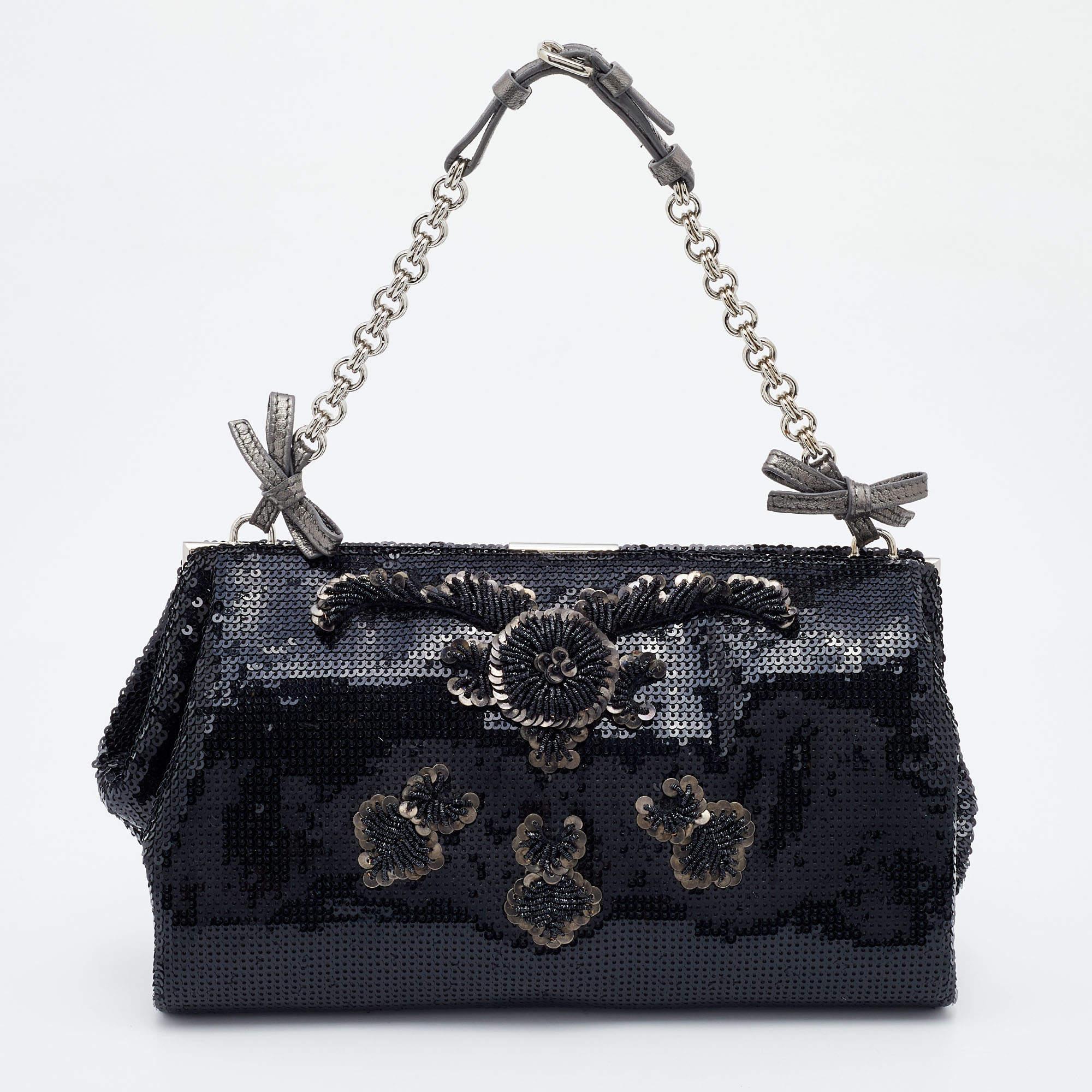 This designer bag is a buy that is worth every bit of your splurge. Exquisitely crafted from the finest materials, it is the perfect piece of luxury to own.

Includes: Original Dustbag


