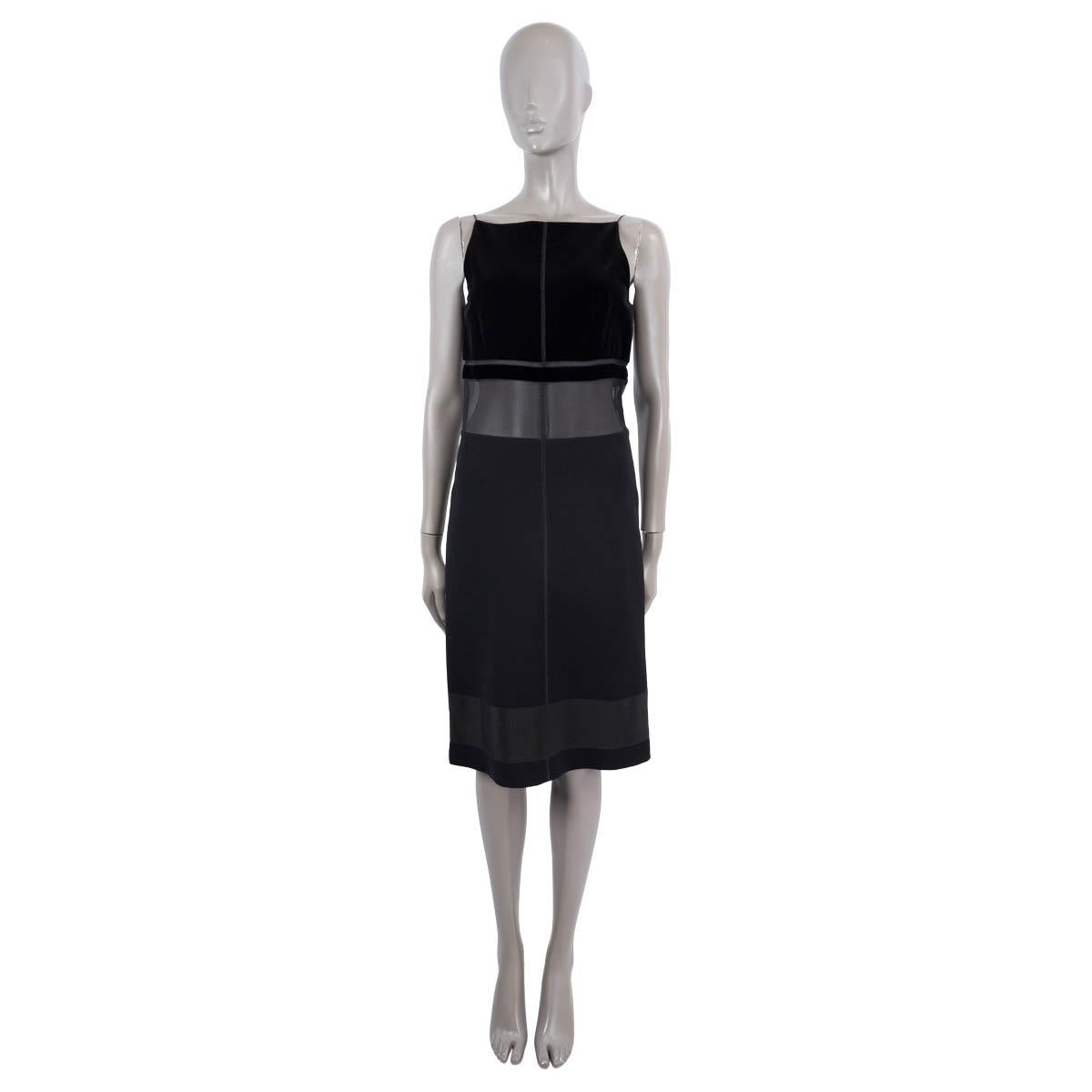 100% authentic Prada sleeveless cocktail dress in black velvet cotton (100%) and skirt part in wool (100%). The design features spaghetti straps, a black grosgrain band on the hem and on the back embellished with a flat bow, sheer panelled details
